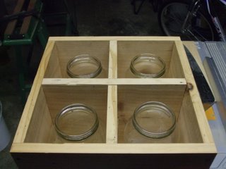 Top of box showing divider and jars in place